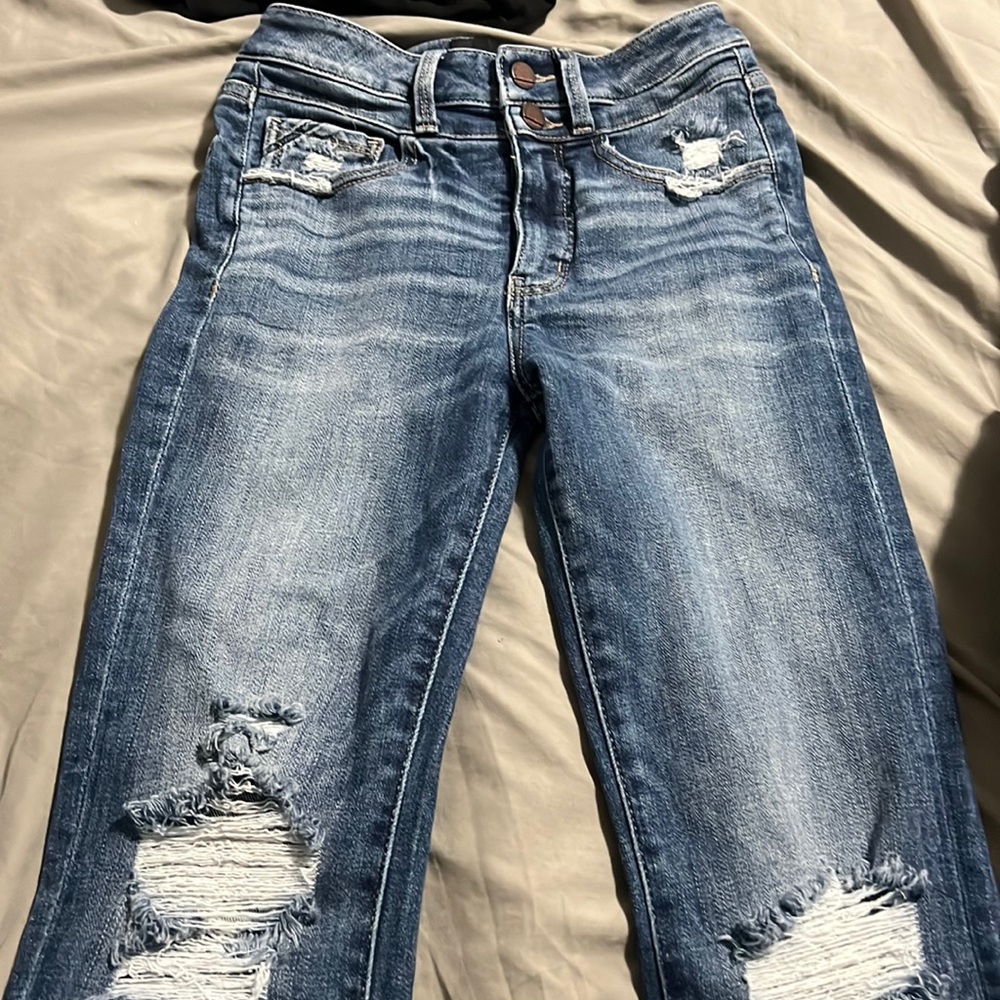 Worn once buckle black flare sat denim flare jeans.